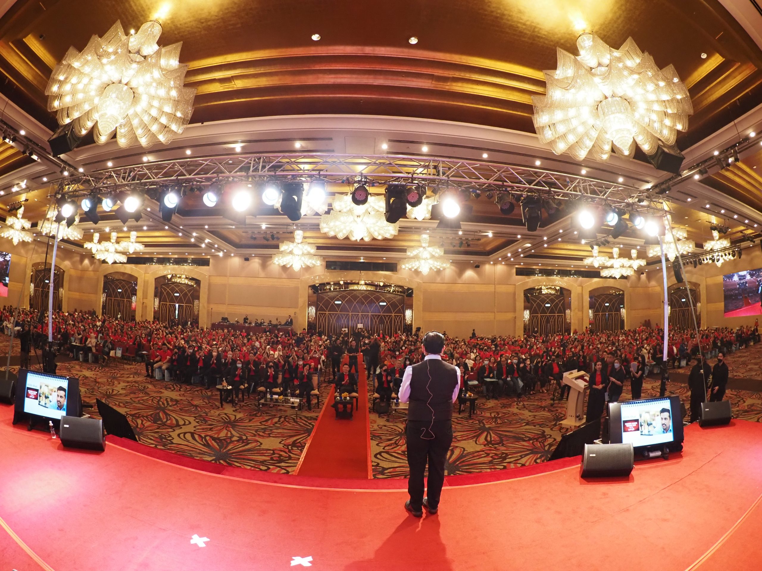 Suresh Dhawan speaking at a keynote event
